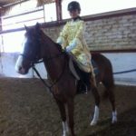 Scuola equitazione Kappa Equestre bambino su cavallo